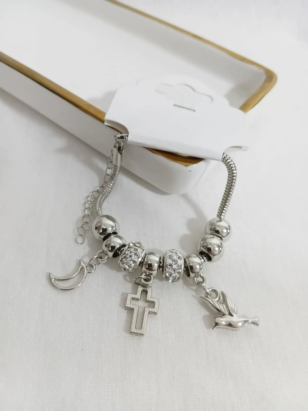 Pulseira prateada berloque — foto 1