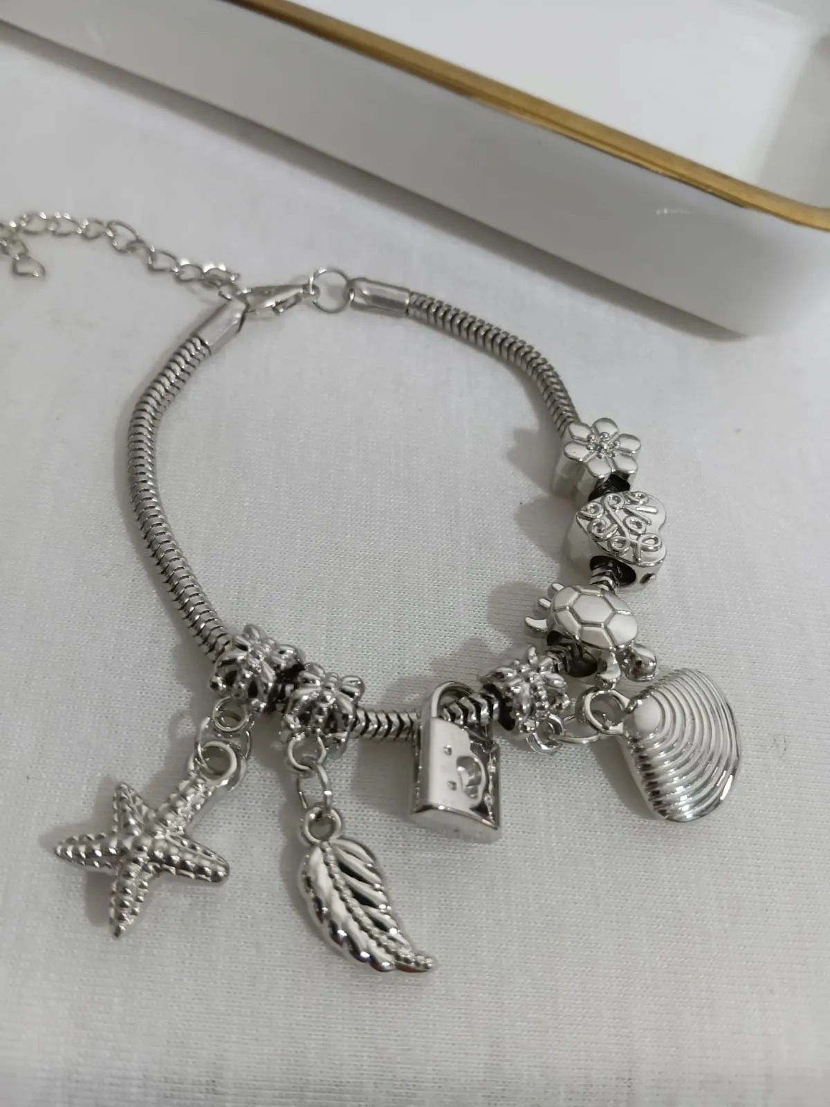 Pulseira prateada berloque — foto 3