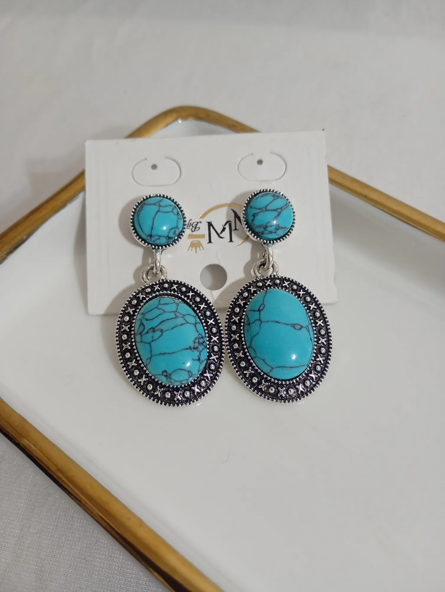 Brinco azul metal envelhecido — foto 1